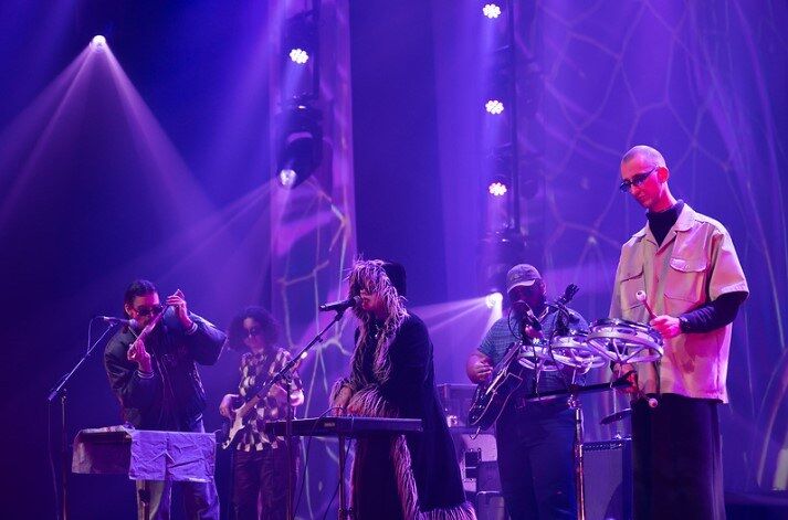 Samara alofa and band perform The Beths winning scroll